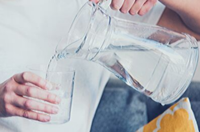  Pitcher pouring water into a glass