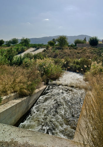 Devolución de agua al río