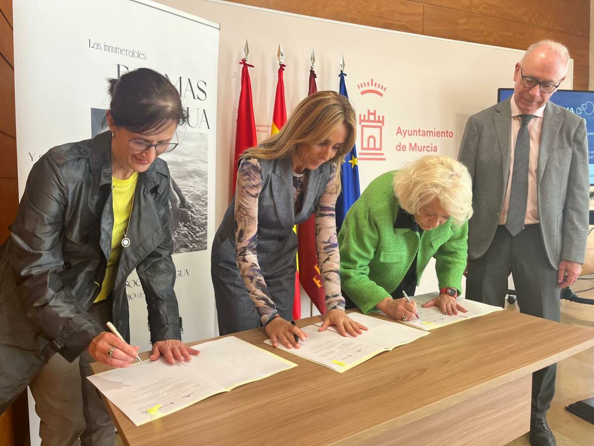 REPRESENTANTES FIRMANDO EL CONVENIO DE COLABORACION